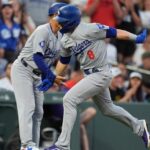 Ohtani has 2 hits to close on batting leader Arraez in Triple Crown bid as Dodgers beat Rockies 13-2