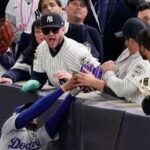 2 fans ejected from World Series game for trying to pry ball from a player’s glove