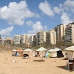 People in Beirut seek shelter on beaches as Israeli strikes continue