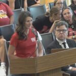 Woman accused of assault, using racial slur at DPS board meeting sues district, others in federal court