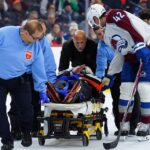 NHL referee taken off ice on stretcher during Avalanche game