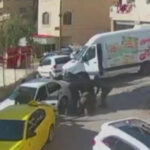 Israeli soldiers hide in white van to arrest Palestinian man