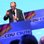 German frontrunner pledges to lead in Europe before key election