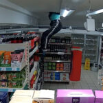 Thief in UK caught on camera climbing through supermarket roof